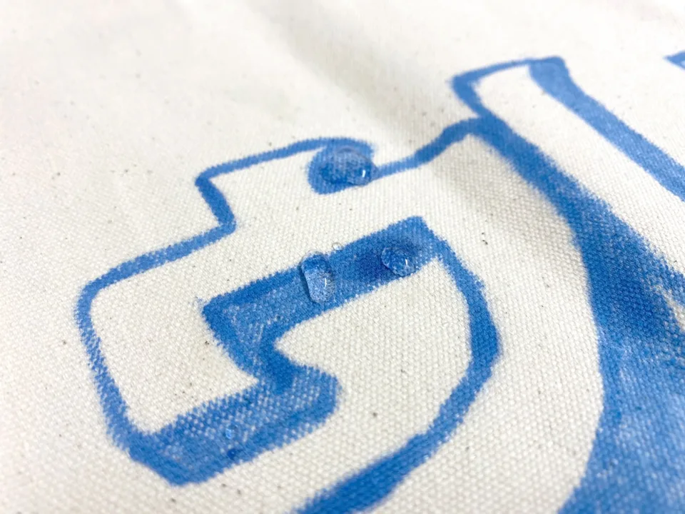 Water beading up on fabric painted with UREHERO